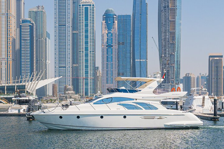 Experience the stunning skyline of Dubai while cruising on a luxurious yacht. Relax with refreshments as you explore iconic landmarks like Burj Al Arab and Palm Jumeirah.